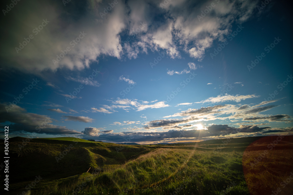 Green grass meadow in iceland with early morning