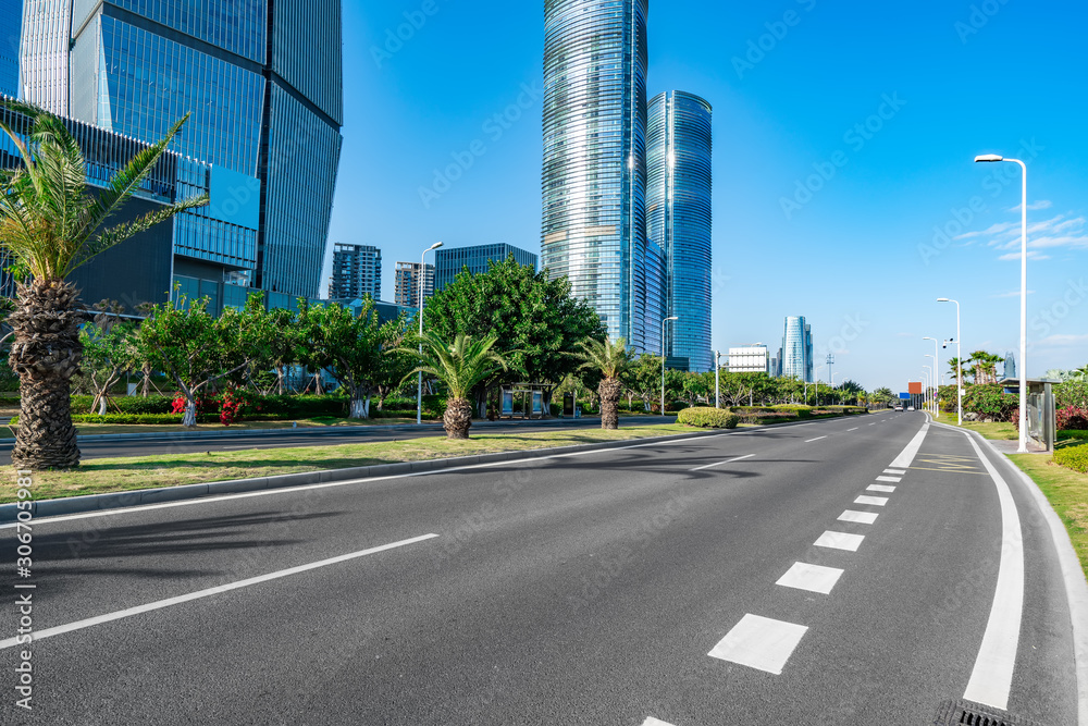 Modern office buildings and urban roads in Xiamen Financial District..