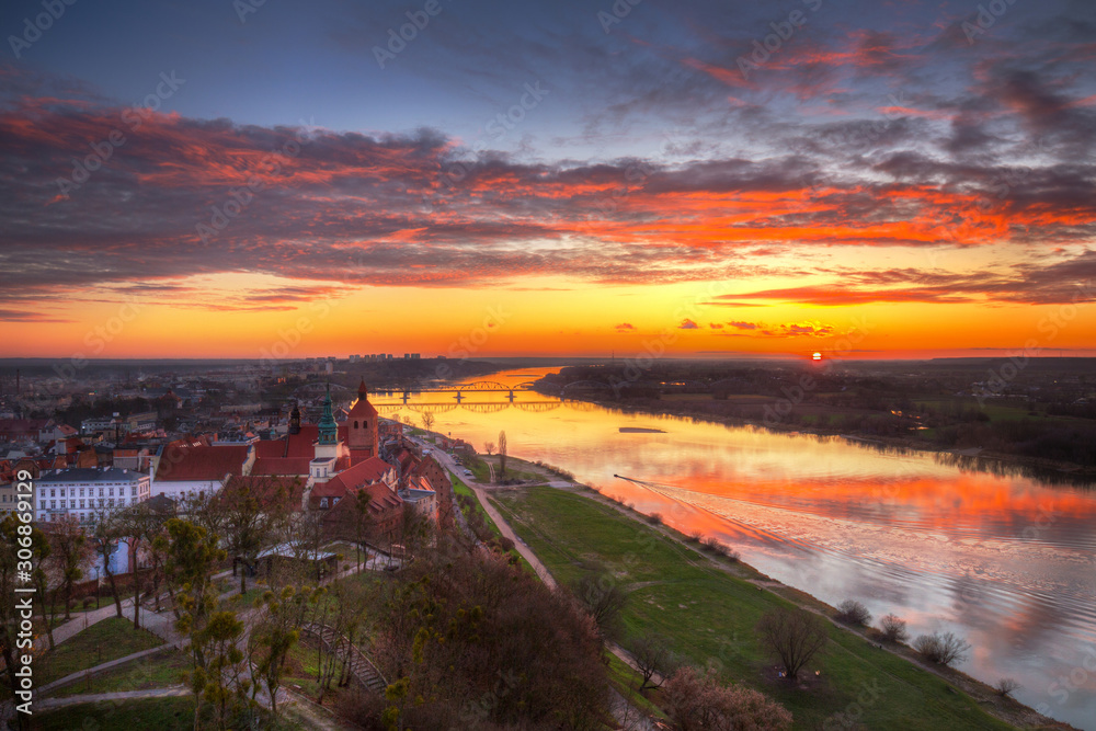 Old town of Grudziadz and the Vistula River at sunset. Kuyavian-Pomeranian Voivodeship, Poland.