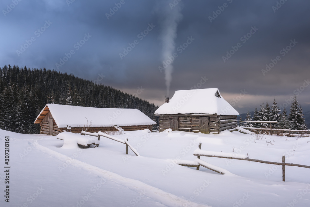 Fantastic landscape with snowy house