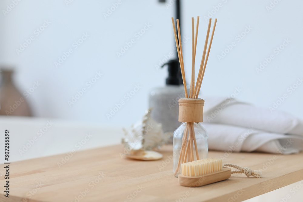 Bath accessories on wooden table