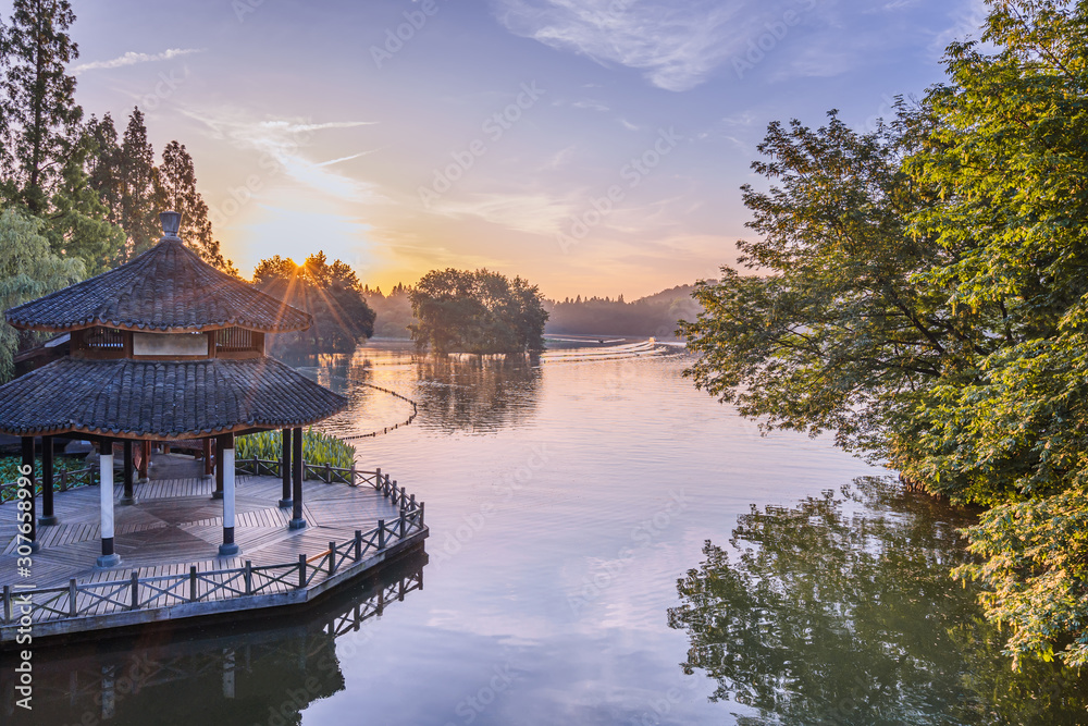 A pavilion during sunrise in West Lake in Hangzhou, Zhejiang province锛孋hina with all Chinese words o