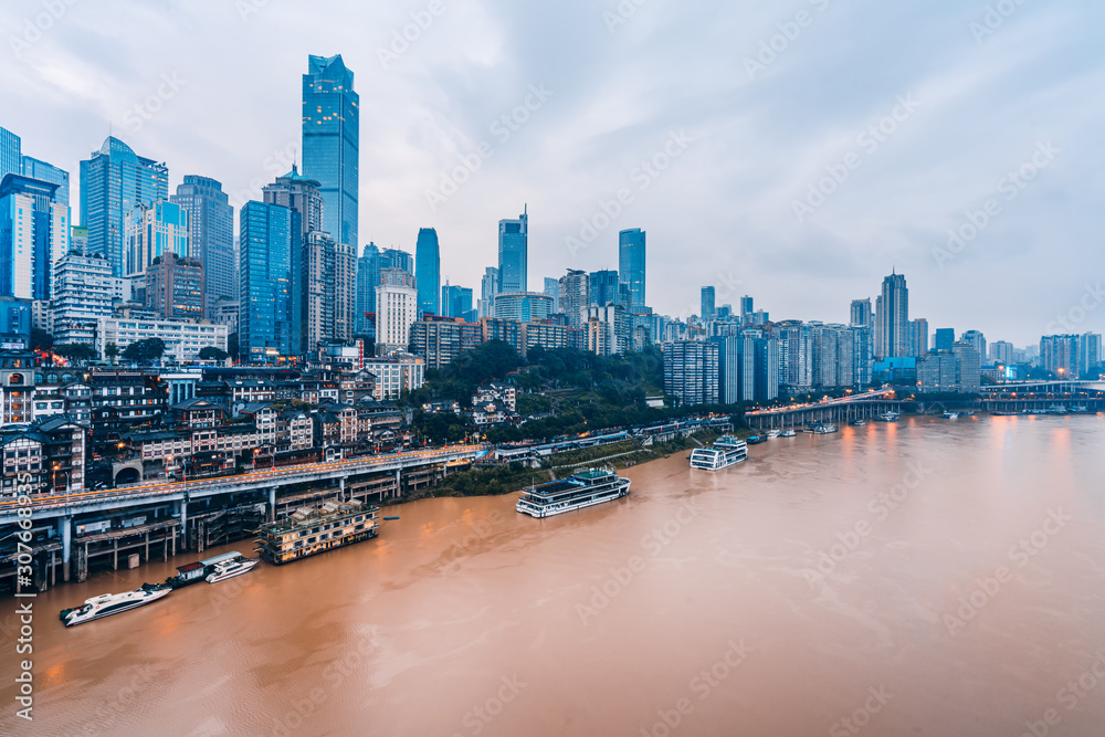  Hongya Cave  and skyline along Jialing River in Chongqing, China