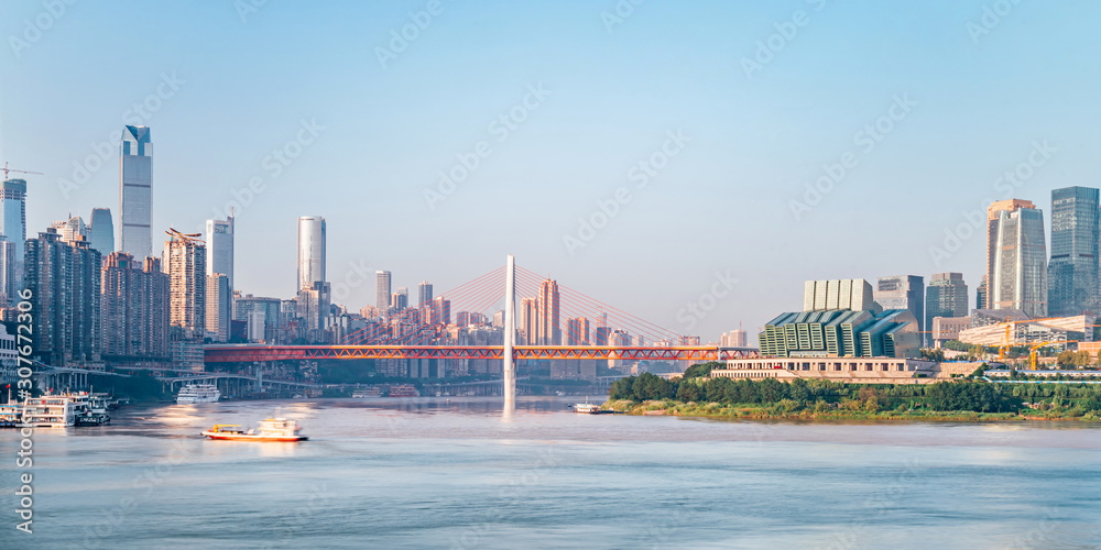 A close-up of the sunny scenery of high-rise buildings and Bridge cities in Chongqing, China