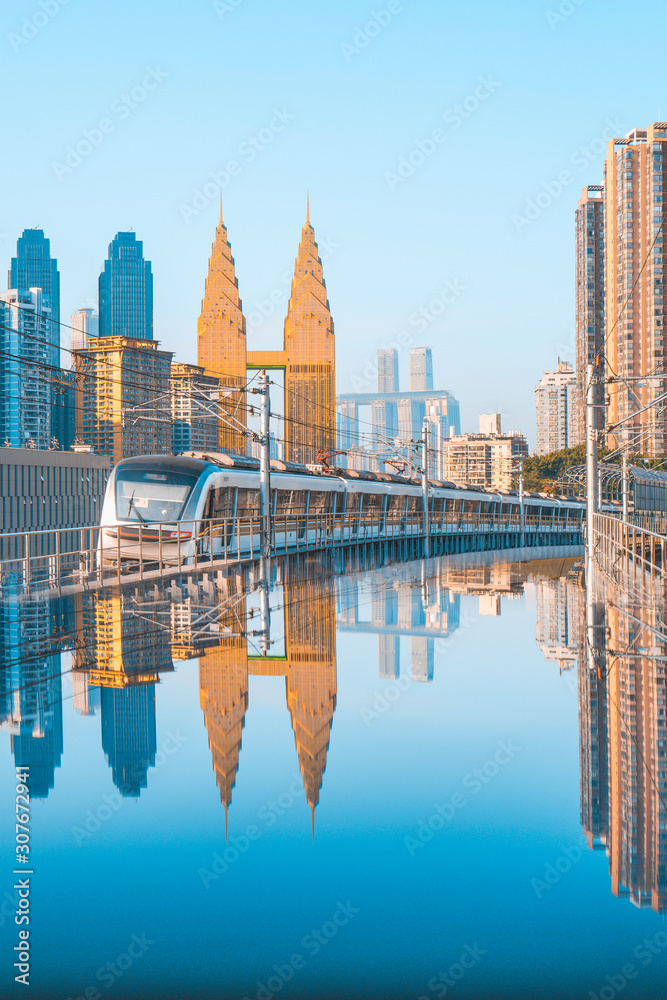 Light rail platform and high-rise buildings in Chongqing, China