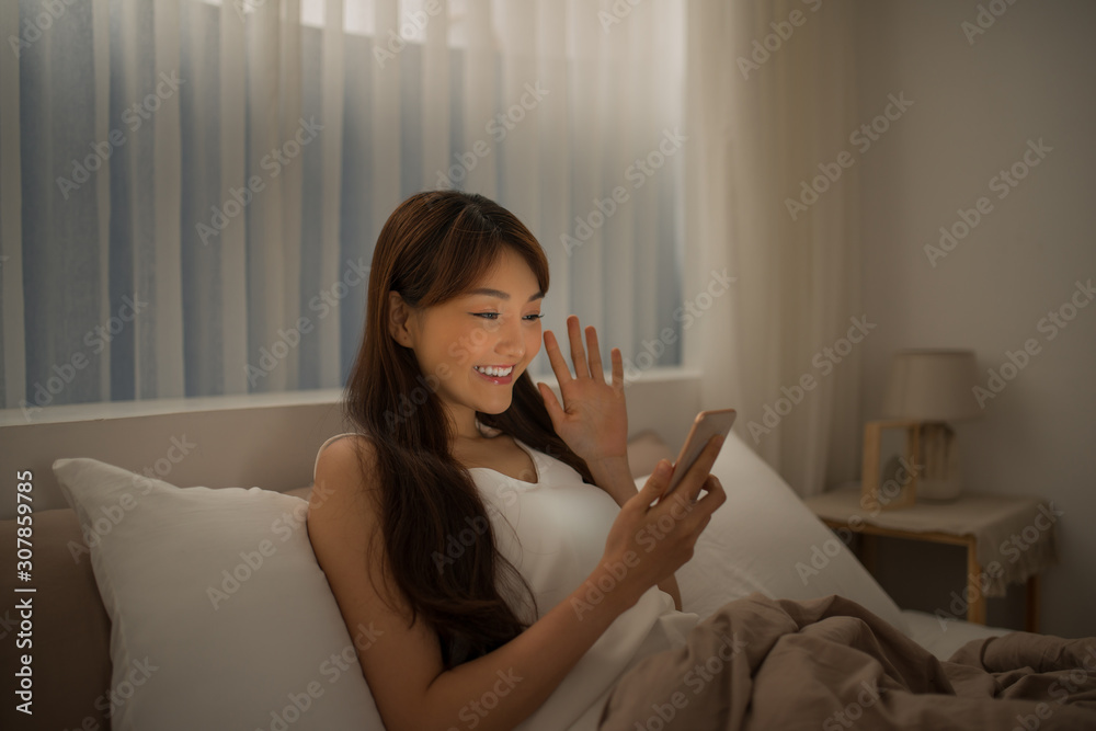 Young woman read message on cellphone