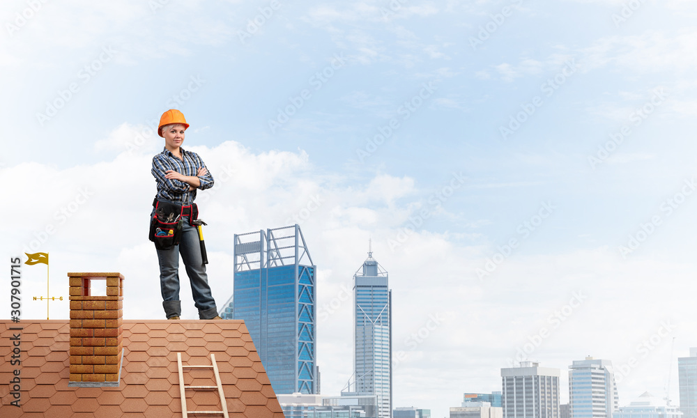 Attractive female worker in hardhat