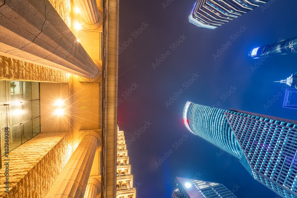 Shanghai Lujiazui city street night view and modern architecture office building