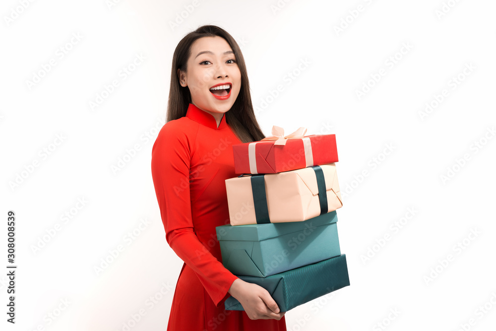 portrait of happy asian woman holding on gift box while celebrating lunar new year