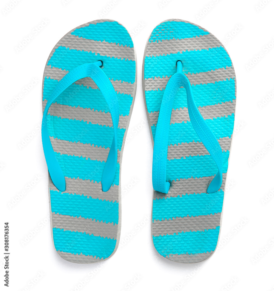 Stylish flip-flops on white background