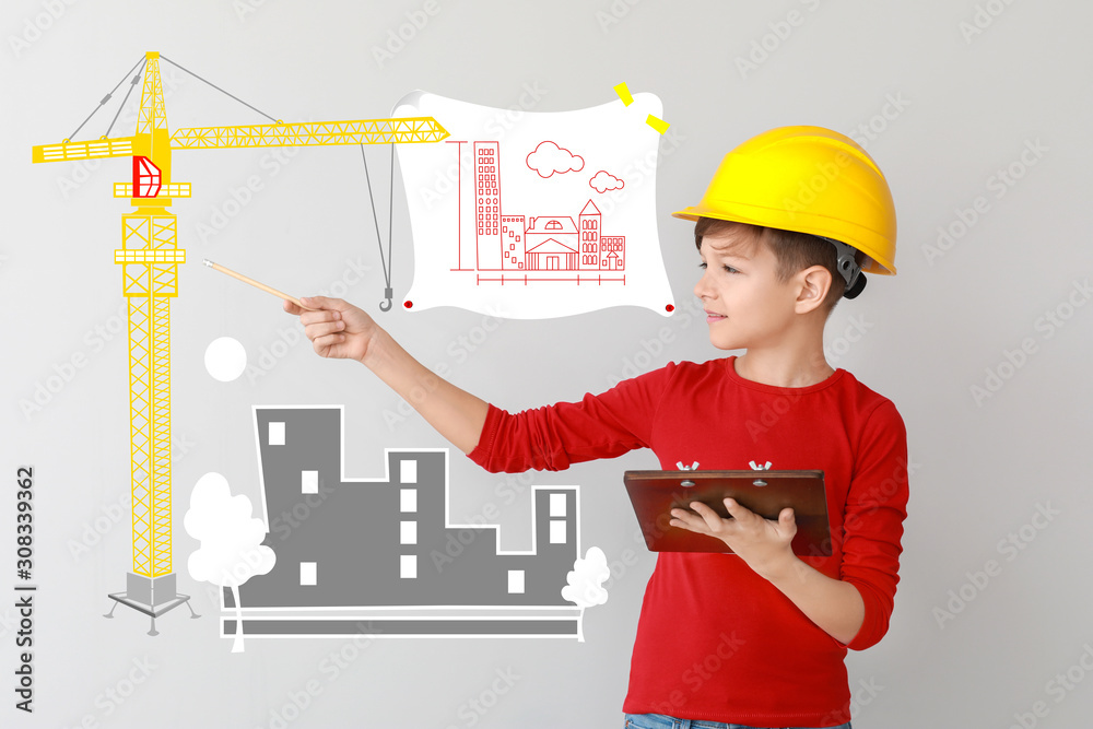 Cute little foreman on light background