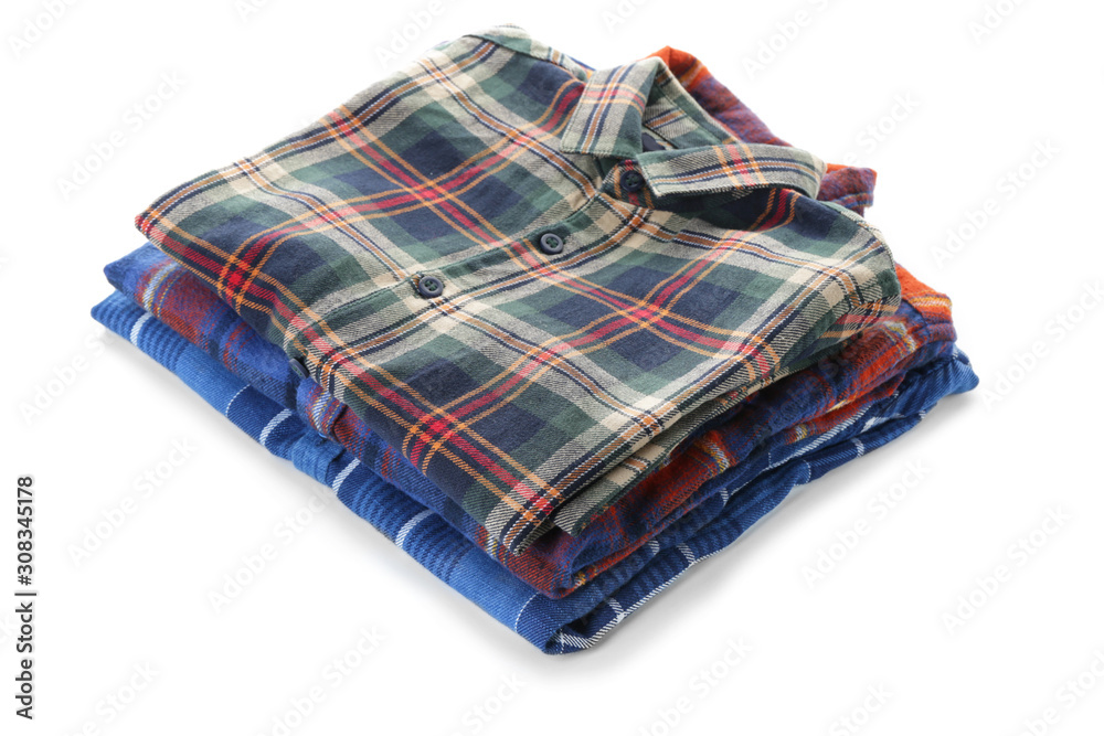 Stack of clean clothes on white background