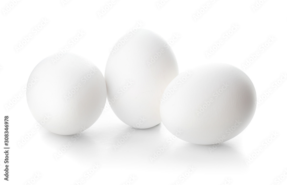 Fresh raw eggs on white background