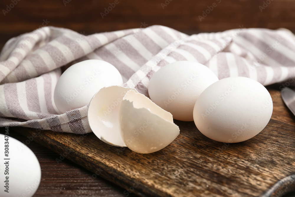 Fresh raw eggs on table