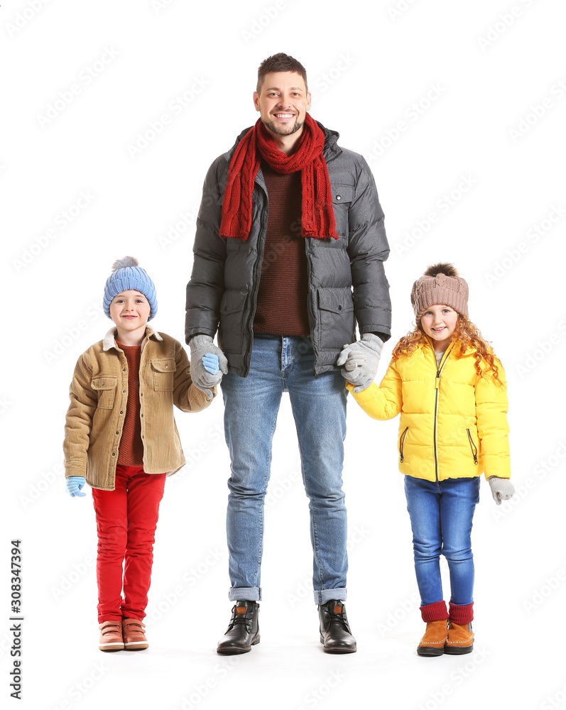 Happy family in winter clothes on white background