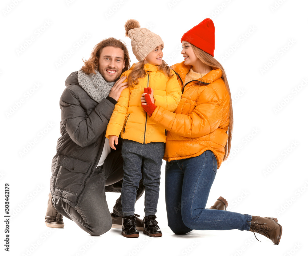 Happy family in winter clothes on white background