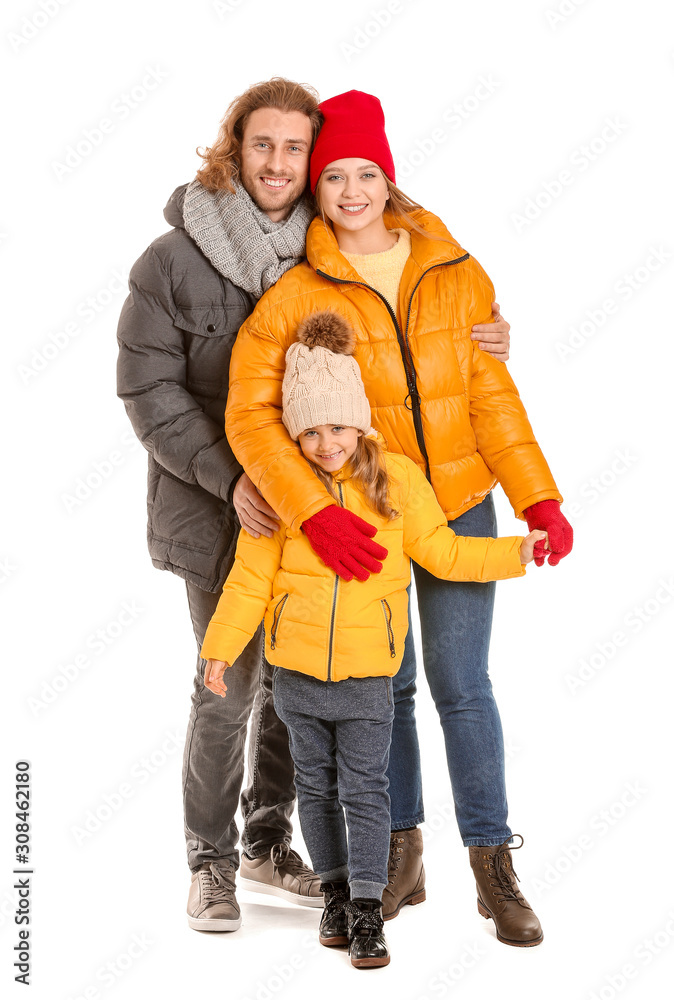 Happy family in winter clothes on white background