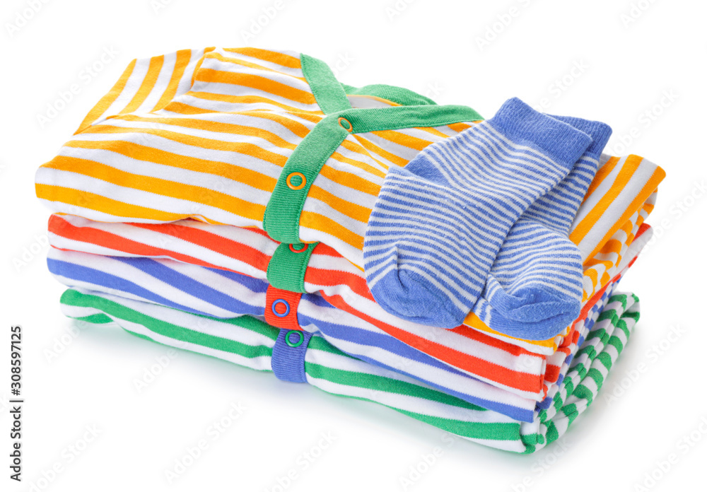 Stack of clean kid clothes on white background