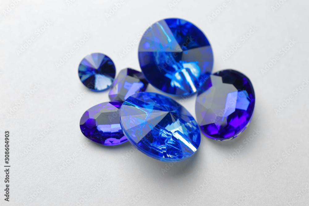 Precious stones for jewellery on light background