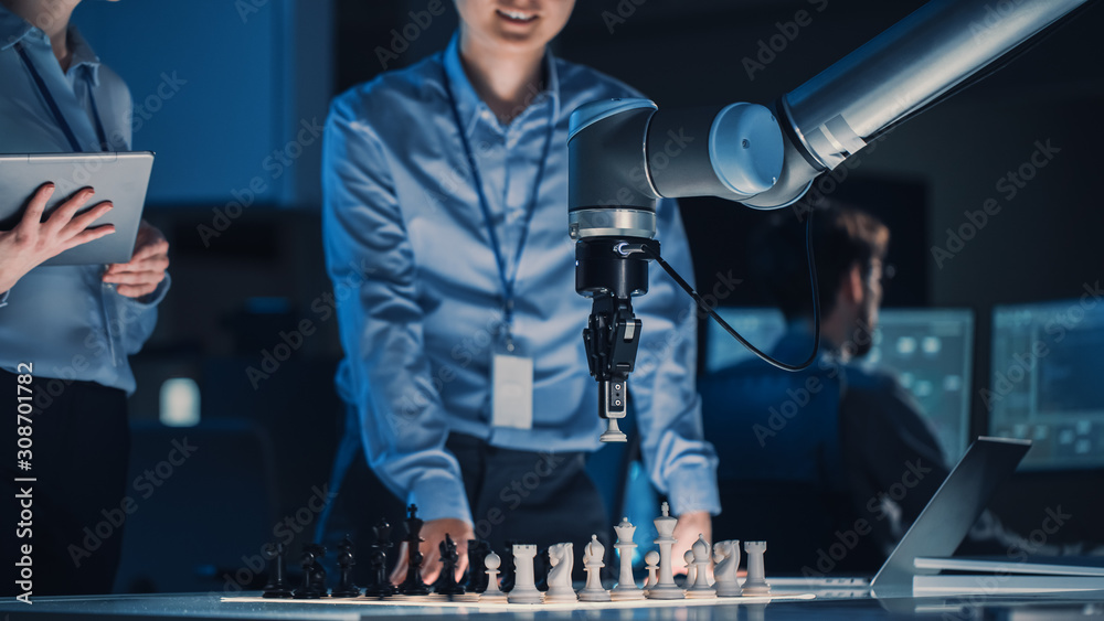 Two Development Engineers are Discussing and Testing an Artificial Intelligence Interface by Playing