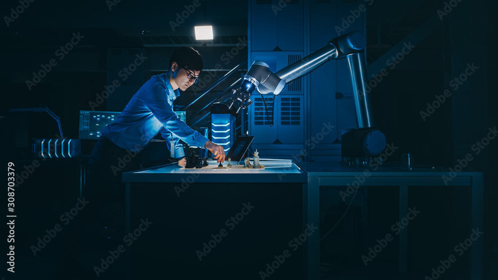 Japanese Development Engineer is Testing an Artificial Intelligence Interface by Playing Chess with 