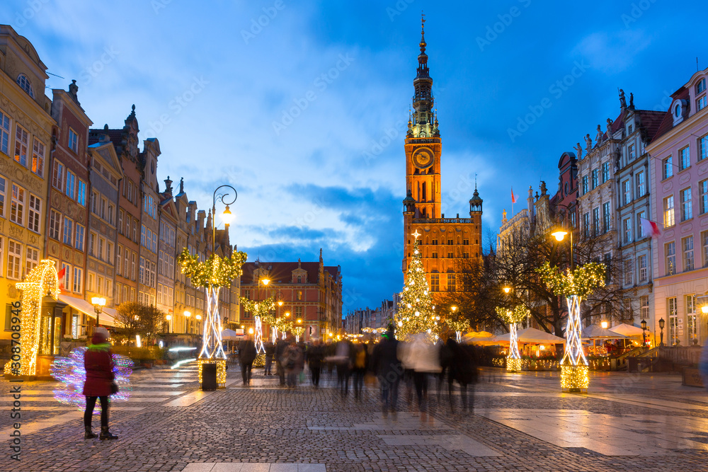 Long Lane and town hall in Gdansk with beautiful Christmas tree at dusk, Poland