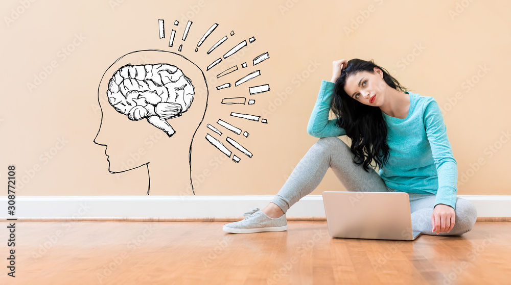 Brain illustration with young woman using a laptop computer