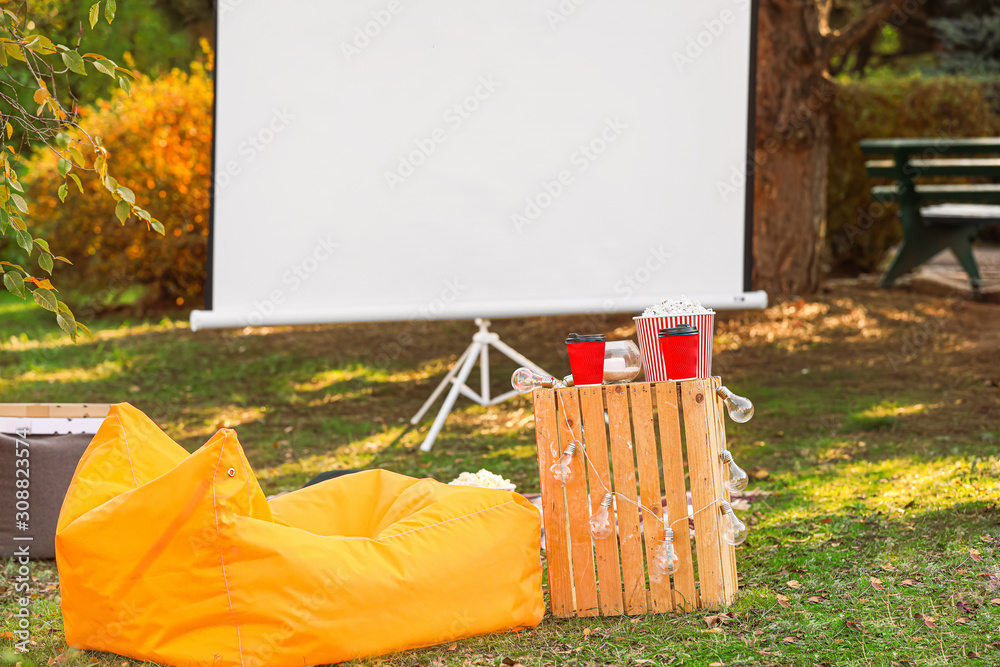 Outdoor cinema in autumn park