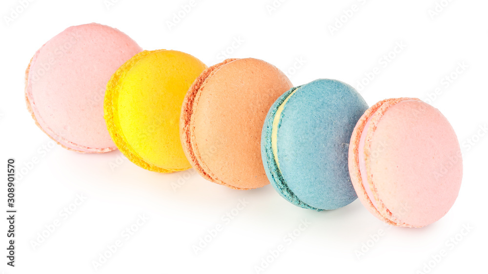 Different tasty macarons on white background