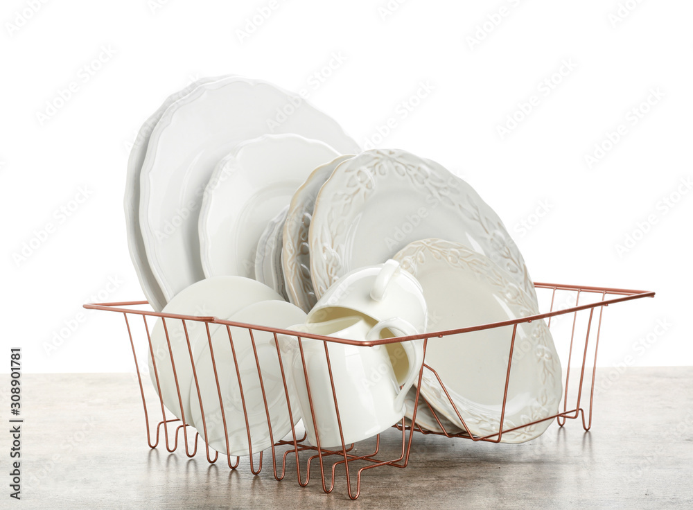 Set of clean tableware on white background