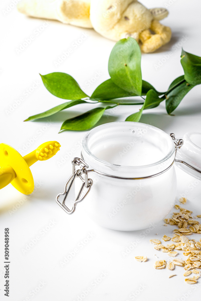 natural organic cosmetics with herbs for baby on white background