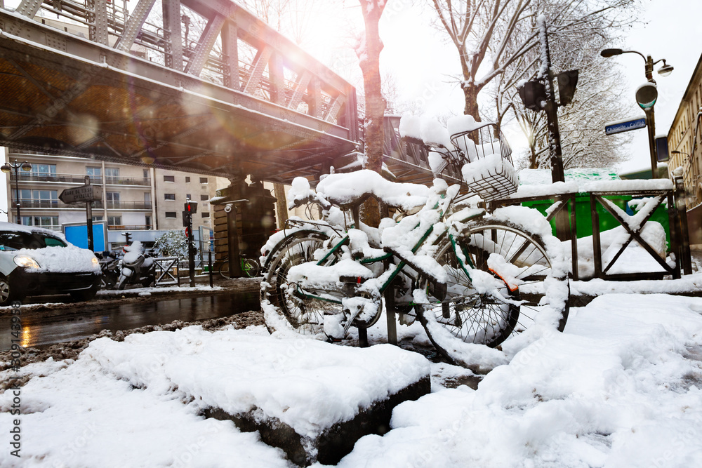 Stalingrad square and metro line under snow, Paris