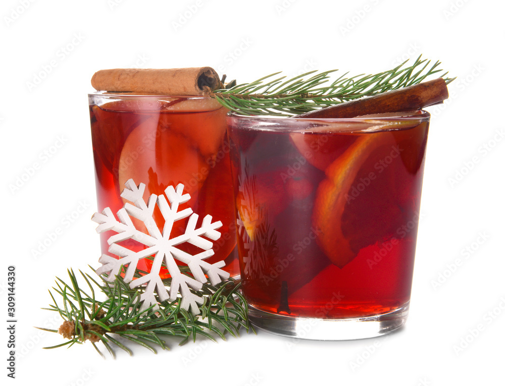 Glasses of tasty mulled wine on white background