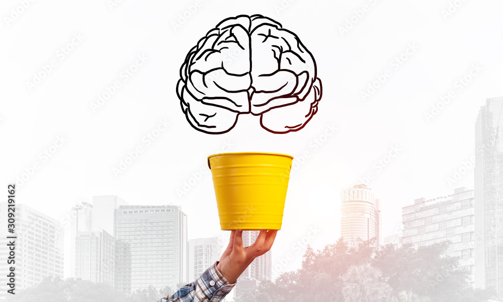 Brain drawing flying above yellow pot