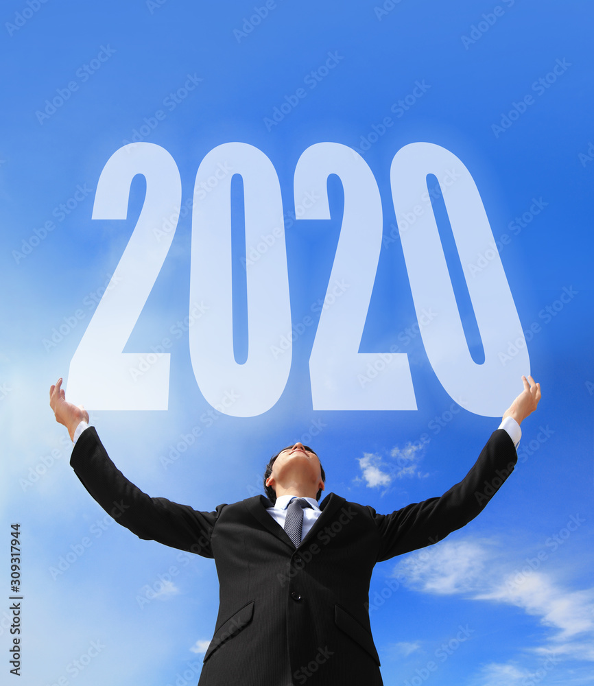 Business man holding 2020