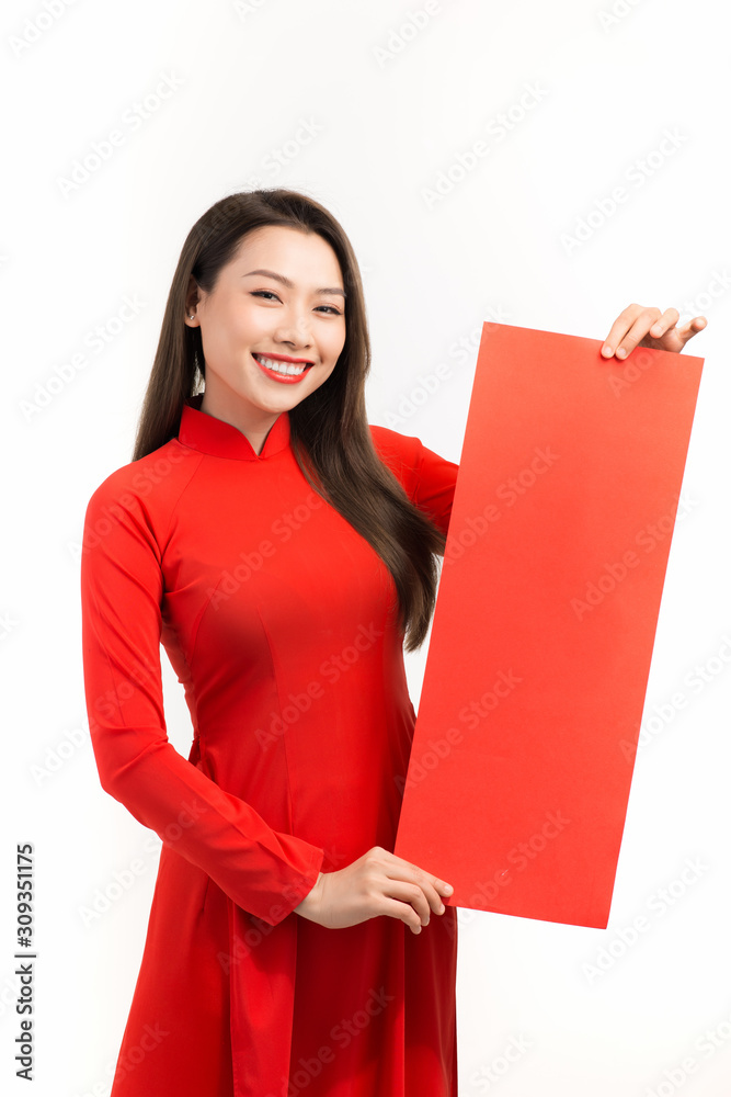 Beauty women wear ao dai and show couplets with Lunar new year