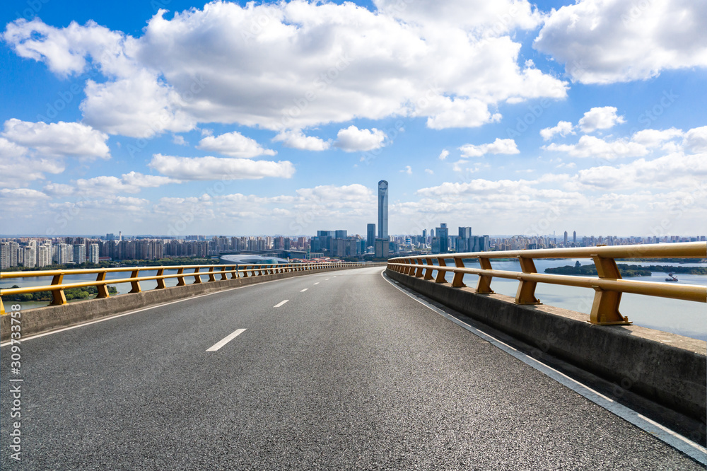 city skyline with road