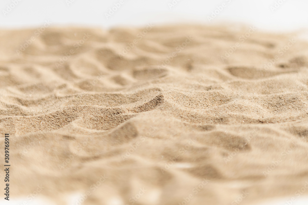 Pile dry sand isolated on white background