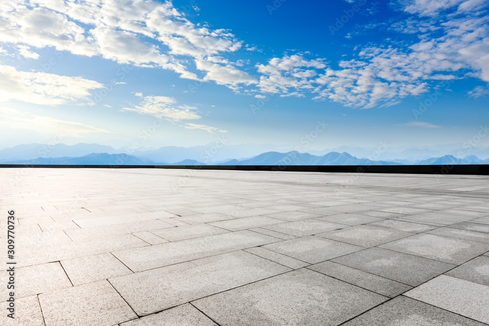 Empty square floor and mountain with clouds landscape.