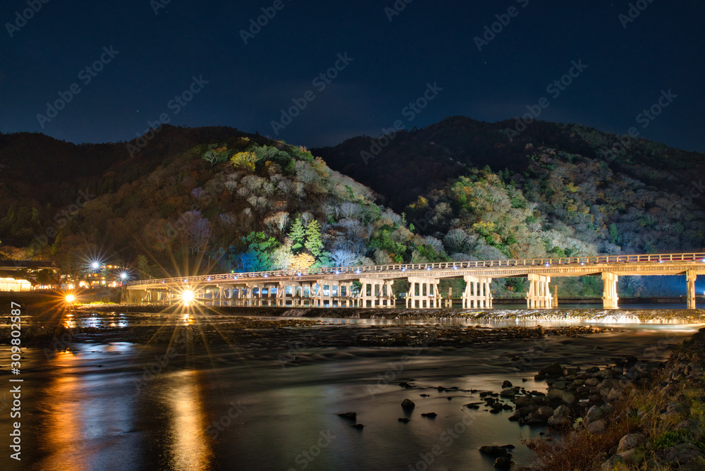 the illuminated bridge Togetsu-kyo in Arashiyama Kyoto Japan