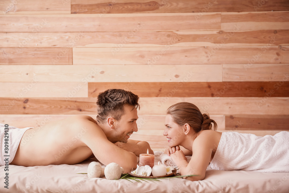 Young couple relaxing in spa salon