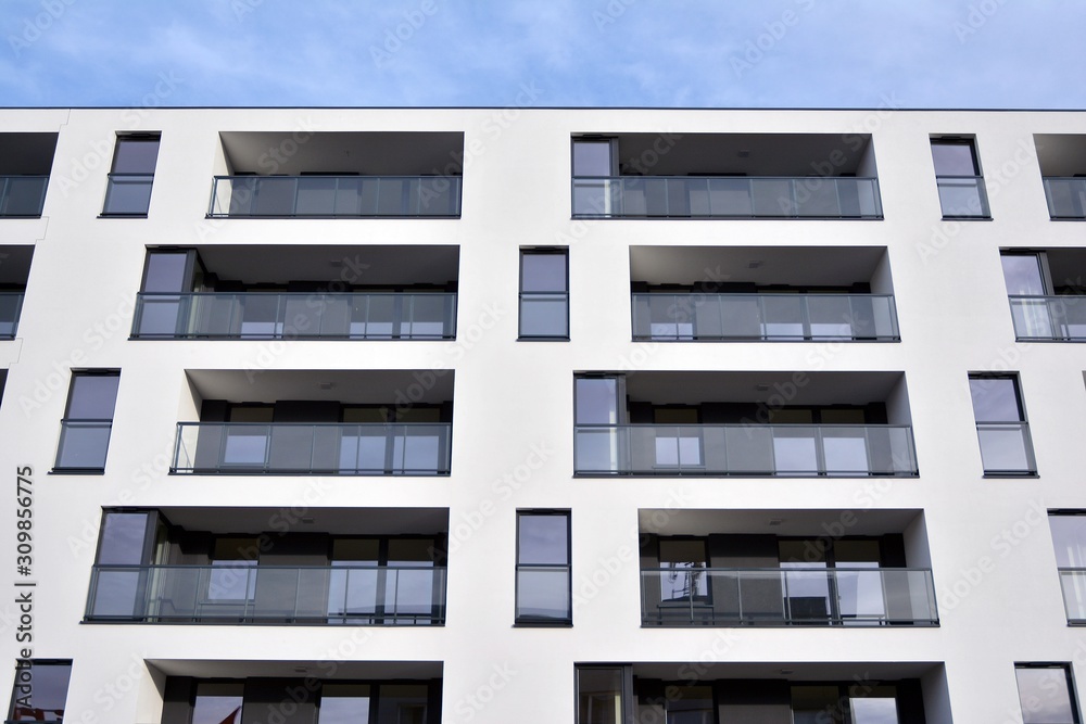 Modern and new apartment building. Multistoried modern, new and stylish living block of flats.