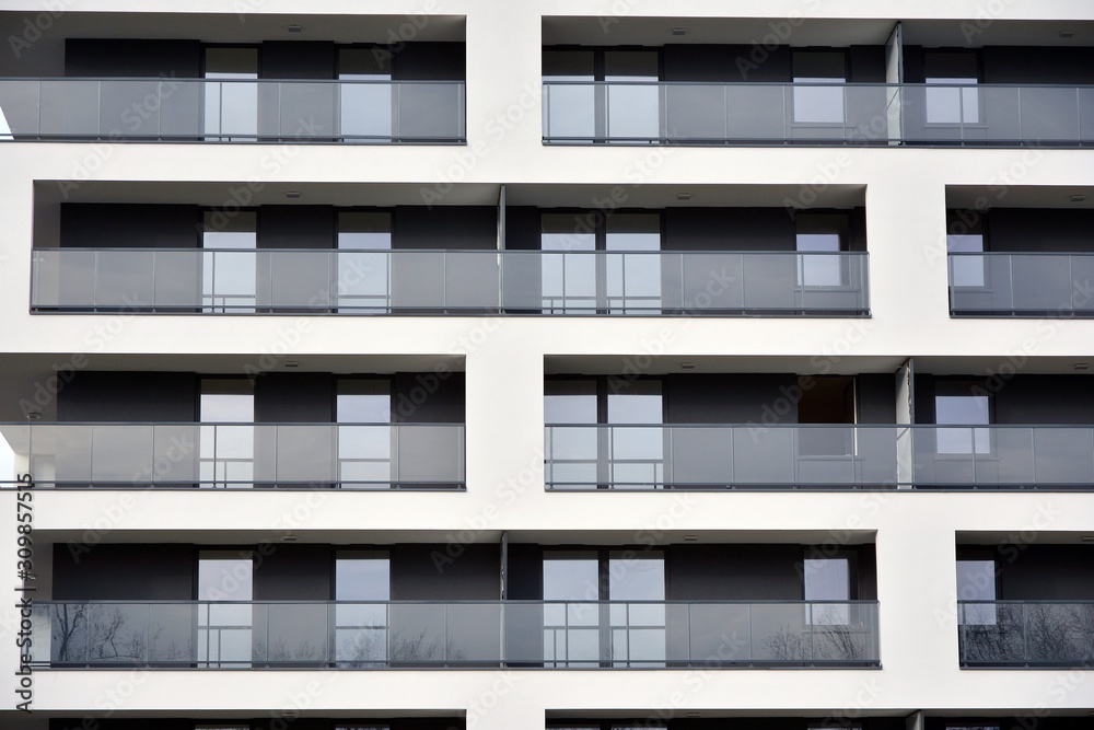 Modern and new apartment building. Multistoried modern, new and stylish living block of flats.