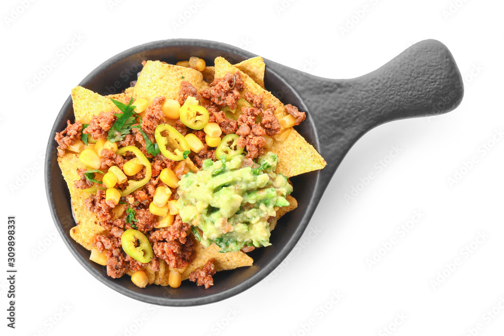 Frying pan with tasty chili con carne and nachos on white background