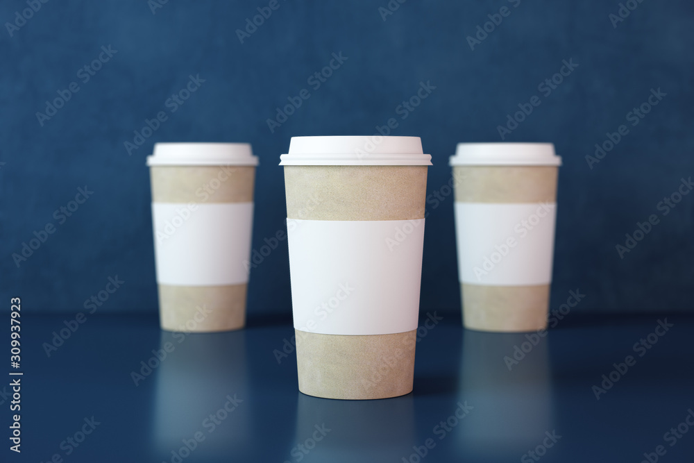 Three white disposable coffee cups