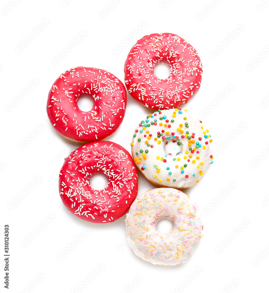 Sweet tasty donuts on white background