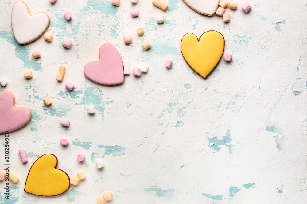 Heart shaped cookies for Valentines day with marshmallows on white background