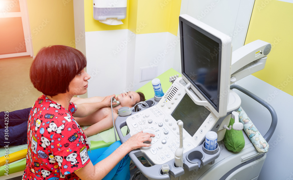 Ultrasound scanner in the hands of a doctor. Diagnostics. Sonography. Pediatric concept, modern tech