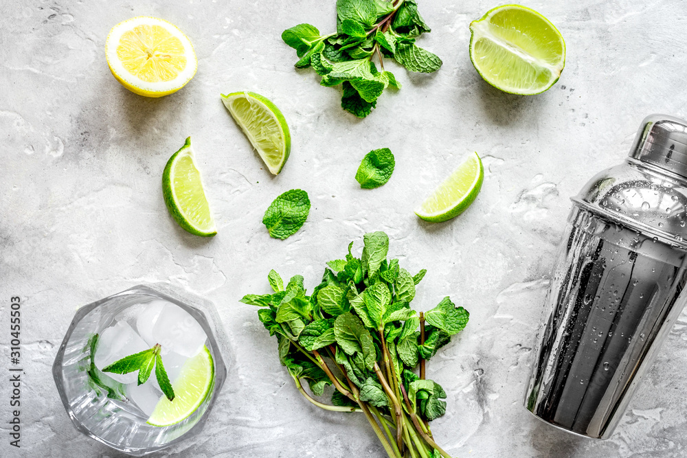 making mojito on stone background top view