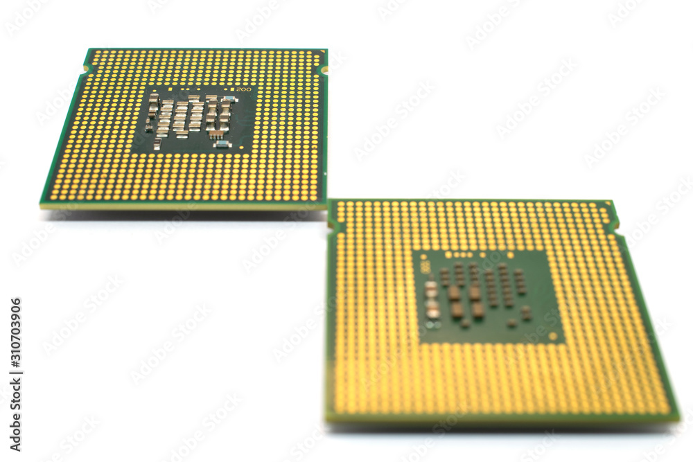 Close up view of two CPU (Central Processing Unit) or Microchip Computer isolated on white backgroun